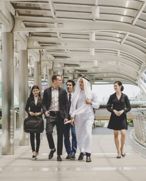 Business partners team walking down and discussing work. Business partners team walking down and discussing work.